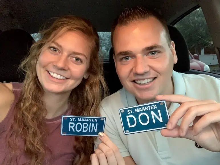 Happy Man and Women holding Nametags