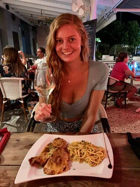 Girl eating Diner at fancy Saint Martin Restaurants
